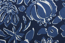 Load image into Gallery viewer,  The Robert Allen© Thea Damask in Indigo, a multipurpose fabric, features a large floral print in blue and white. Constructed for durability, it is rated for 100,000 double rubs and is soil and stain resistant.  It can be used for several different statement projects including window accents (drapery, curtains and swags), toss pillows, headboards, bed skirts, duvet covers, upholstery, and more.
