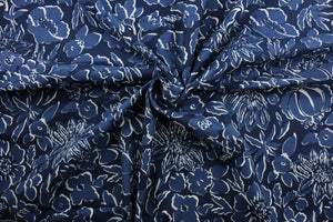  The Robert Allen© Thea Damask in Indigo, a multipurpose fabric, features a large floral print in blue and white. Constructed for durability, it is rated for 100,000 double rubs and is soil and stain resistant.  It can be used for several different statement projects including window accents (drapery, curtains and swags), toss pillows, headboards, bed skirts, duvet covers, upholstery, and more.