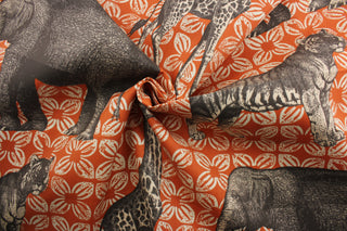 Featuring an ethnically inspired print with elephants, tigers, giraffes, and flowers, this fabric will make a bold statement with its mix of oranges, browns, and beiges.  Made of water-resistant and soil and stain-repellant fabric, this outdoor print will look vibrant and new with minimal maintenance.  Perfect for patio, deck and poolside.  It can be used for several different statement projects including cushions, upholstery projects and decorative pillows. 