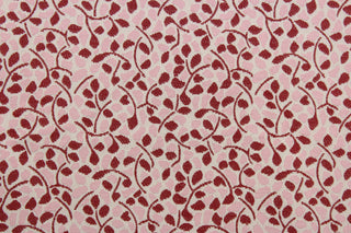 The Robert Allen Berk in Rose is an upholstery fabric made with a polyester blend.  This fabric has an intricate floral design with shades of pink, red, and beige.  It is ideal for a variety of projects, such as sofas, chairs, dining chairs, pillows, handbags, and other craft projects.