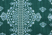 Load image into Gallery viewer, The Robert Allen© Alfama in Emerald features a multipurpose damask print, accented by blue and white on an emerald green background.  It is designed for long-lasting use, with 65,000 double rubs and soil and stain resistance.  It can be used for several different statement projects including window accents (drapery, curtains and swags), toss pillows, headboards, bed skirts, duvet covers, upholstery, and more.
