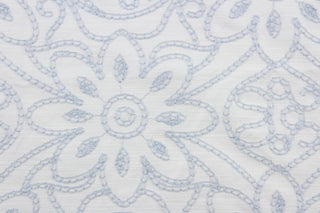 Expertly crafted, the Embroidered Grandfleur in Ivory Vapor is an intricate floral embroidery in powder blue against an ivory background, making a statement of elegance and sophistication.  Uses include drapery, pillows, light upholstery, table runners, bedding, headboards, home décor and apparel.  