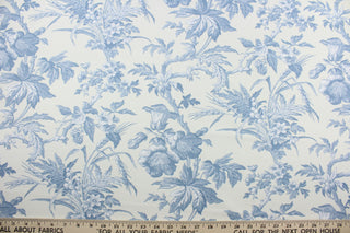 Experience the versatile elegance of Covington© Clara in Blue.  This stunning fabric features a beautiful blue and white floral vine print on a chic off white background.  With 15,000 double rubs, it offers not only style but also durability for multi-use applications.  The fabric is perfect for window accents (draperies, valances, curtains and swags) cornice boards, accent pillows, bedding, headboards, cushions, ottomans, slipcovers and upholstery.  