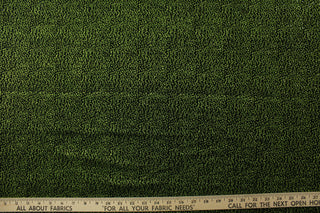 Experience a touch of glamour and elegance with our Glitz in Green.  Shimmer and shine in the green glitter detailing, complemented by a sleek and classic black base.  Enjoy ultimate comfort and flexibility with its 8 way stretch material.  Perfect for adding sparkle to special occasion apparel, dancewear, costumes, overlays, table tops, and decorations. 