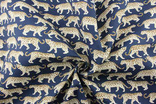  striking white and brown tiger design on a navy blue background, this fabric offers 51,000 double rubs and 500 UV hours, making it both strong and fade-resistant. Plus, its water repellent properties make it ideal for various weather conditions. Great for<span data-mce-fragment="1">&nbsp;cushions, tablecloths, upholstery projects, decorative pillows and craft projects.&nbsp; Recommended to store away when not in use.</span>