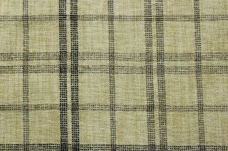 The P/Kaufmann© Macalister in Tuxedo is a versatile and stylish addition to any room. This chenille fabric, features a classic tan and black plaid design that adds a touch of sophistication to your décor. Great for upholstery projects including sofas, chairs, dining chairs, pillows, handbags and craft projects.&nbsp;&nbsp;