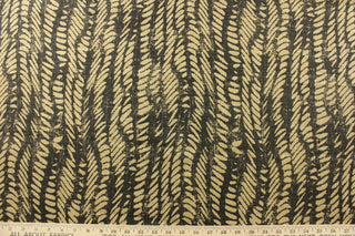 multipurpose use with its cotton blend and contemporary wavy stripe pattern in shades of charcoal and tan. With a high abrasion resistance of 15,000 double rubs, this fabric is perfect for any project that requires both style and durability.&nbsp;The versatile fabric is perfect for window accents (draperies, valances, curtains and swags) cornice boards, accent pillows, bedding, headboards, cushions, ottomans, slipcovers and upholstery. <span data-mce-fragment="1">&nbsp;</span>