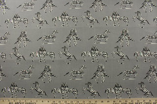  Experience the perfect blend of style and durability with PK Lifestyles© Novogratz Outdoor Zebra in Silver.&nbsp; This beautifully designed fabric features elegant black, white, and gray zebras on a stunning silver background.&nbsp; With a remarkable 33,000 double rubs, it's built to last.&nbsp; Great for<span data-mce-fragment="1">&nbsp;cushions, tablecloths, upholstery projects, decorative pillows and craft projects.&nbsp; Recommended to store away when not in use.</span>