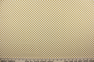 Bliss is a beautiful, lightweight fabric featuring small yellow flowers scattered across a white background.  Perfect for any living space, it is sure to bring a splash of joy to your home. The high-quality cotton material ensures lasting durability and softness.  It would be great for apparel, quilting, crafting and sewing projects.  