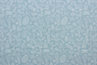  This beautiful, 100% cotton fabric features a white and blue forest design, complete with pine cones, berries, leaves, and acorns.  The high-quality cotton material ensures lasting durability and softness. The versatile lightweight fabric is soft and easy to sew.  It would be great for apparel, quilting, crafting and sewing projects.  