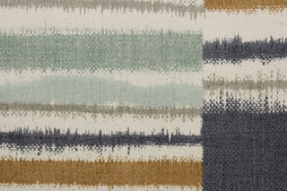 Seydou features a subtle tribal stripe design in a blend of blue, light green, beige, brown, bronze, and silver colors.  It can be used for several different statement projects including window accents (drapery, curtains and swags), decorative pillows, hand bags, bed skirts, duvet covers, light upholstery and craft projects.  
