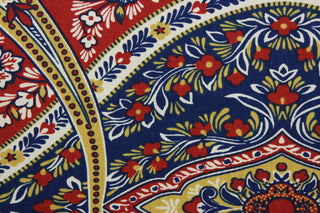 This multi-purpose fabric features a vibrant floral damask print with a subtle mix of bold red, blue, mustard yellow, and white colors. Crafted with a soil and stain repellent finish, it's perfect for anything from drapery to upholstery.  It can be used for several different statement projects including window accents (drapery, curtains and swags), toss pillows, headboards, bed skirts, duvet covers, upholstery, and more.
