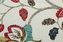 Load image into Gallery viewer, Robert Allen© Spring Mix in Poppy, a multi-use linen blend fabric featuring a classic mottled floral and leaf print.  Its lovely poppy, brown, goldenrod, gray, and teal blend beautifully against an ivory background, and it offers top-notch durability with 30,000 double rubs and stain and water repellent protection. It can be used for several different statement projects including window accents (drapery, curtains and swags), toss pillows, headboards, bed skirts, duvet covers, upholstery, and more.
