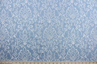 For an elegant, timeless look, Robert Allen© Floral in Blue is the perfect choice. Featuring an embroidered floral design in white against a sky blue background, this multi-purpose fabric is ideal for light duty upholstery, window treatments, accent pillows, bedding, and home décor.
