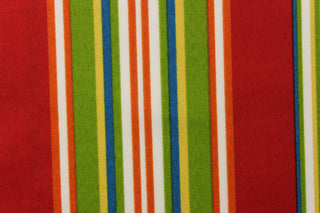 This fabric features a striped design in red, green, white, blue, orange and yellow.