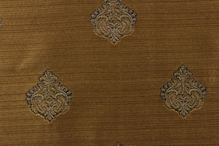 Ornamental damask medallion with hints of gray and dark brown on a gold background