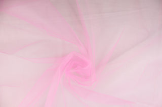 A sheer, semi firm, netting tulle in a true pink . 