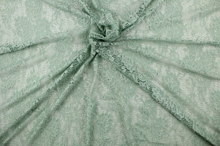 This stretch lace features an intricate floral design in moss green.  It is sheer and breathable with a nice soft drape.  Uses include, apparel, dancewear, costumes, curtains and home decor.