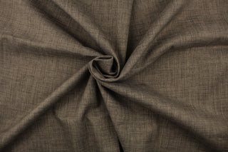 A mock linen in shades of brown with a scrim backing. 