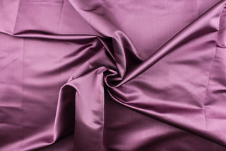 This elegant silk fabric in purple has a lustrous look and can be used for multi purpose upholstery, bedding, accent pillows, drapery and apparel. 