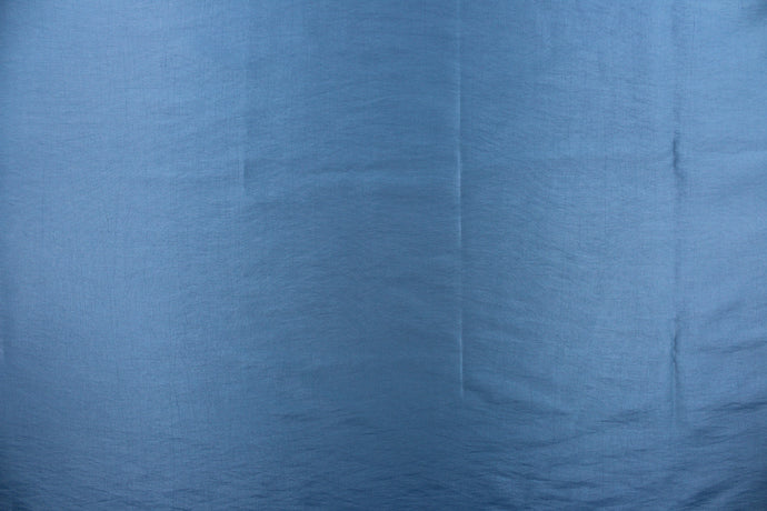 This taffeta fabric in a solid blue. 