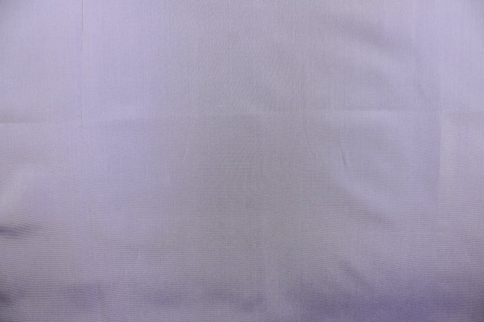  Taffeta fabric in iridescent light purple with gray undertones. 