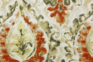  This fabric features a damask design in green, orange, beige, pale yellow, gray, and white . 