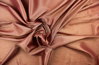 This taffeta fabric in a rich iridescent bonze.