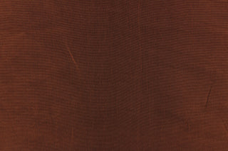 This taffeta fabric in a rich iridescent bronze.