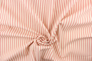 This heavy striped fabric in red and off white would be a wonderful accent to your home decor.