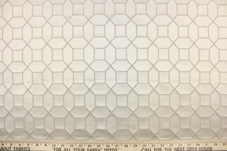 This elegant woven jacquard features a geometric design in dark sand against a satin sand background.  It is clean and crisp and would work well for draperies, curtains, cornice boards, pillows, cushions, bedding, headboards and furniture upholstery.  It has a rating of 9,000 double rubs.