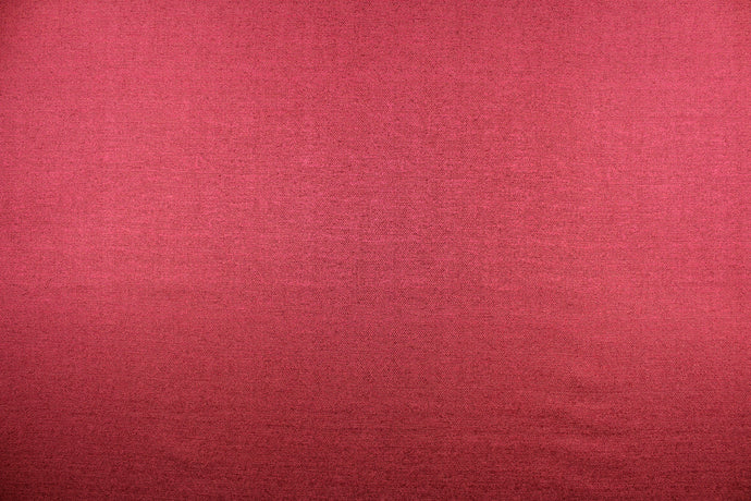 This textured semi sheer fabric in cardinal red has a slight shimmer and is perfect for curtains, swags, window scarfs and drapery panels.  We offer Mariposa in several different colors.