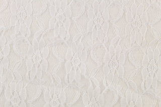 This lace features a woven floral design in white . 