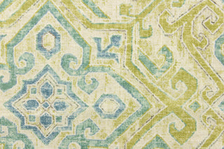 This multi purpose fabric features a geometric medallion print in green and blue on a cream background. It is perfect for window treatments, decorative pillows, handbags, light duty upholstery applications.  This fabric has a soft workable feel yet is stable and durable with 12,000 double rubs.  