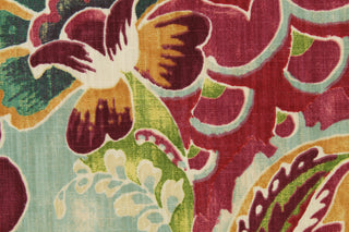 This fabric features a paisley design in teal, burgundy, golden yellow, green, blue and off white  .
