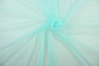  A sheer, light weight, and semi firm tricot in light soft blue. 