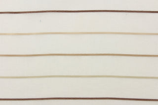 This sheer fabric features a thin stripe design in tan, pale taupe, beige, and brown against off white. 