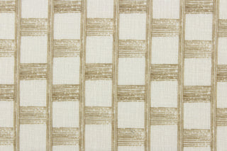 This sheer fabric features a checkered design in a wheat brown against a white background.