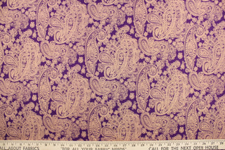 This fabric features paisley design in peach against a light violet background.  It has a nice soft hand and would be great for quilting, crafting and home decor.  We offer this fabric in several different colors.