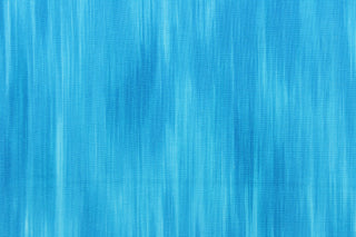 This fabric features stripes in varying shades of turquoise and blue that blend together to create a beautiful color palette.  It has a nice soft hand and would be great for quilting, crafting and home decor.  We offer this pattern in several different colors.