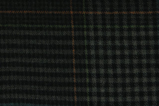 This multi use wool features a plaid design in ebony black, gray, blue and orange and is great for cooler weather.  It has a great hand and is hard-wearing.  The durability and wrinkle resistance makes it perfect for suits, jackets, overcoats, dresses, drapery and upholstery projects.