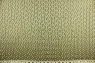 This fabric features a diamond design in toffee, olive green and peach and has a slight sheen that enhances the design.  It is durable and hard wearing and would be great for multi-purpose upholstery, bedding, accent pillows and drapery. 