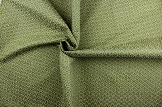 Integrated is a multi use fabric featuring a diamond pattern in shades of green and beige.  It is durable and hard wearing and would be great for multi-purpose upholstery, bedding, accent pillows and drapery.  