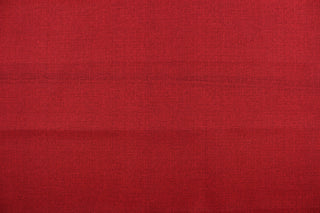 An outdoor fabric in a beautiful solid red with hints of a dark red. Use this for outdoor upholstery, cushions, pillows, etc. This fabric can withstand 500 hours of sunlight and is stain and water resistant. To maintain the life of the fabric we suggest bring it indoors when not using. We offer this design in several different colors. 
