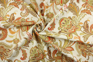 This fabric features a floral and paisley print in orange, pale yellow, green, taupe, red and off white with gold accents.  It is durable with 12,000 double rubs.  It is perfect for window treatments (draperies, valances, curtains, and swags), bed skirts, duvet covers, pillow shams, accent pillows, tote bags.  