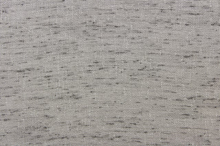  A sheer fabric  in a light gray weave into black .
