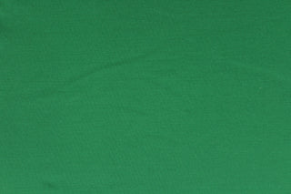  A 8 way stretch jersey lycra in a solid green. 