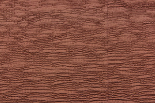 This taffeta fabric features a crinkle in brown. 