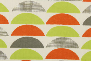 This fabric features various large scale half-circles screen printed on 100% cotton duck.  Colors included are lime green, orange, gray and off white.  The multi use fabric is perfect for window treatments, decorative pillows, custom cushions, bedding, light duty upholstery applications and almost any craft project.  This fabric has a soft workable feel yet is stable and durable with 50,000 double rubs.