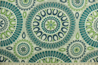 Embark is a versatile medium/heavyweight fabric featuring a mosaic medallion design in green, teal, taupe and ivory.  It can be used for several different statement projects including window accents (drapery, curtains and swags), decorative pillows, hand bags, bed skirts, duvet covers, light duty upholstery and craft projects.  